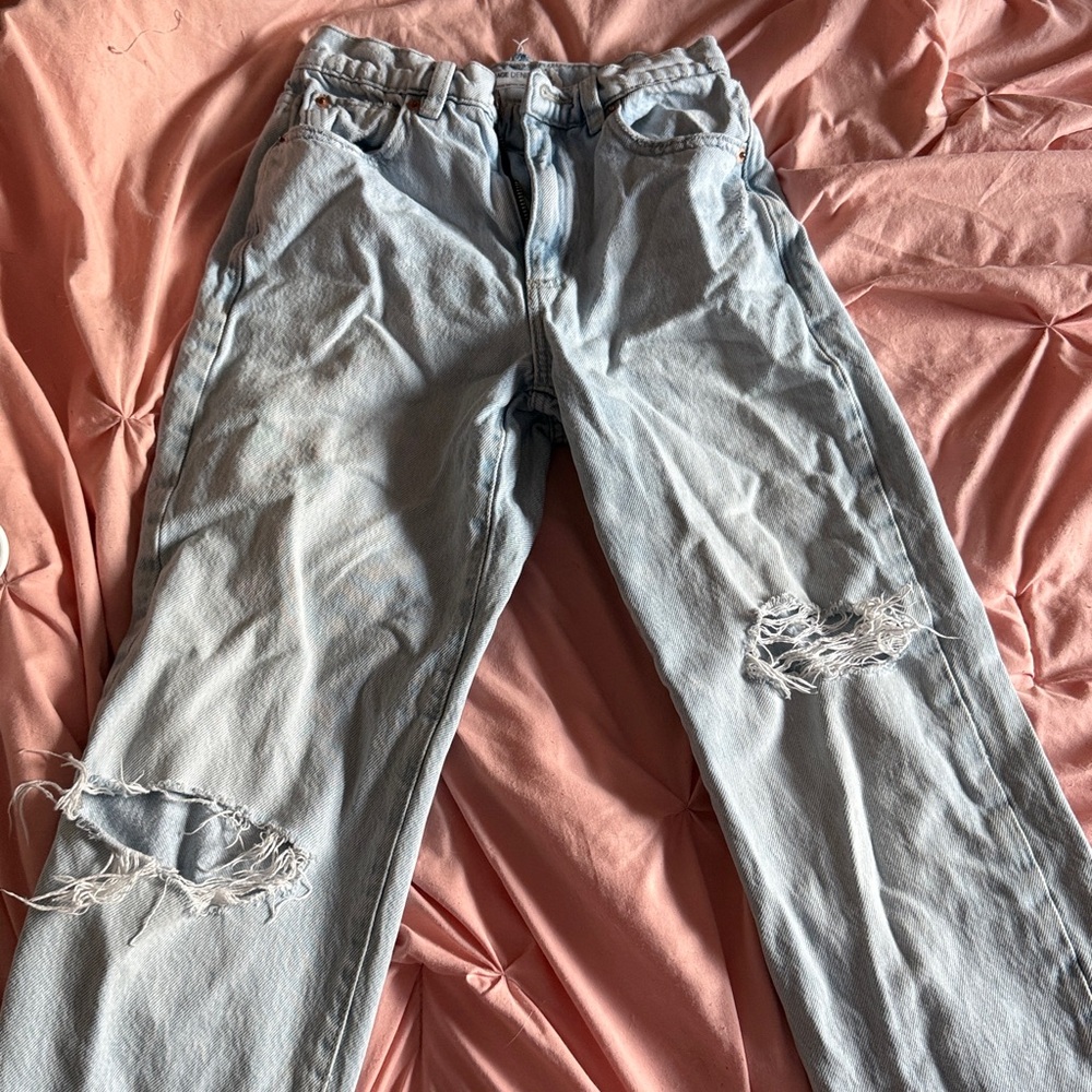 Distressed Light Blue Jeans